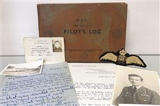 Pilot's Log: The Story of a Photographic Reconnaissance Spitfire Pilot, with original personal letters, photographs, his military pass and RAF insignia